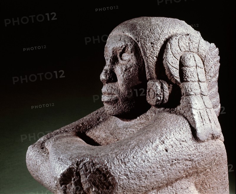 Seated figure of Xochipilli, the Aztec god of music and dance