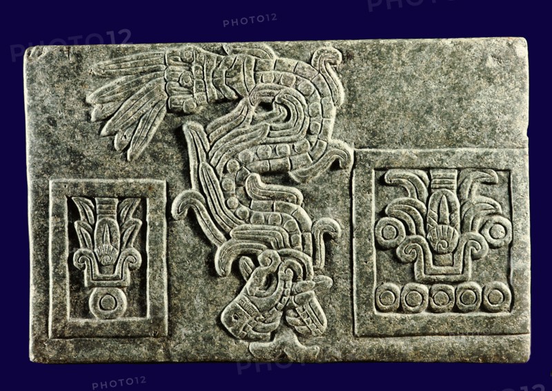 Relief showing the Feathered Serpent, major symbol of Quetzalcoatl, descending between two symbols of years