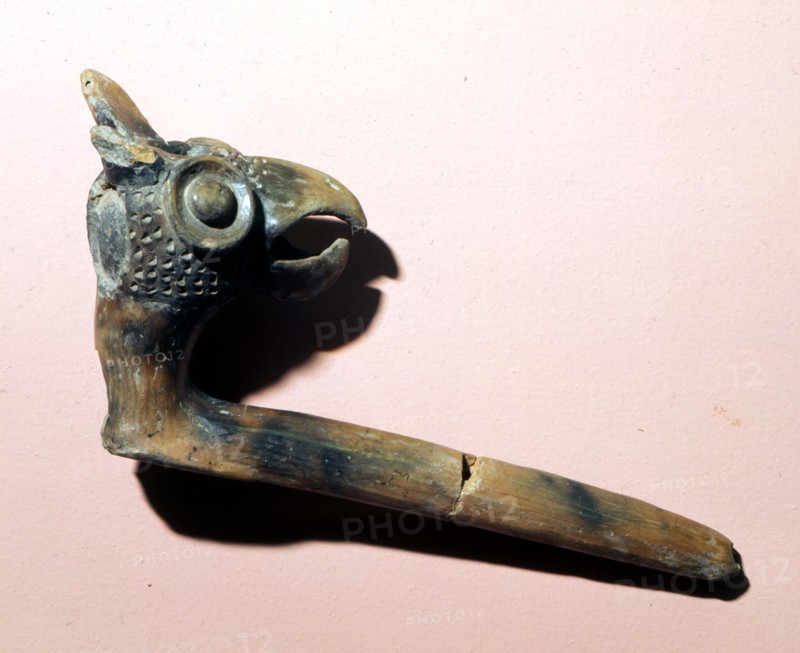 Pipe with the eagle head symbol of the sun god