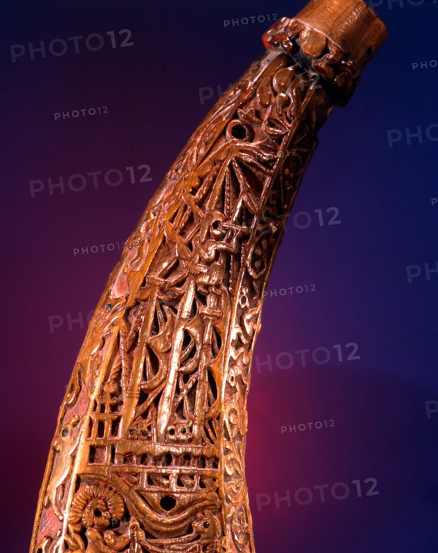 Powder horn carved with Aztec motifs and gods as well as a Spanish ship complete with a look   out perched on the cental mast