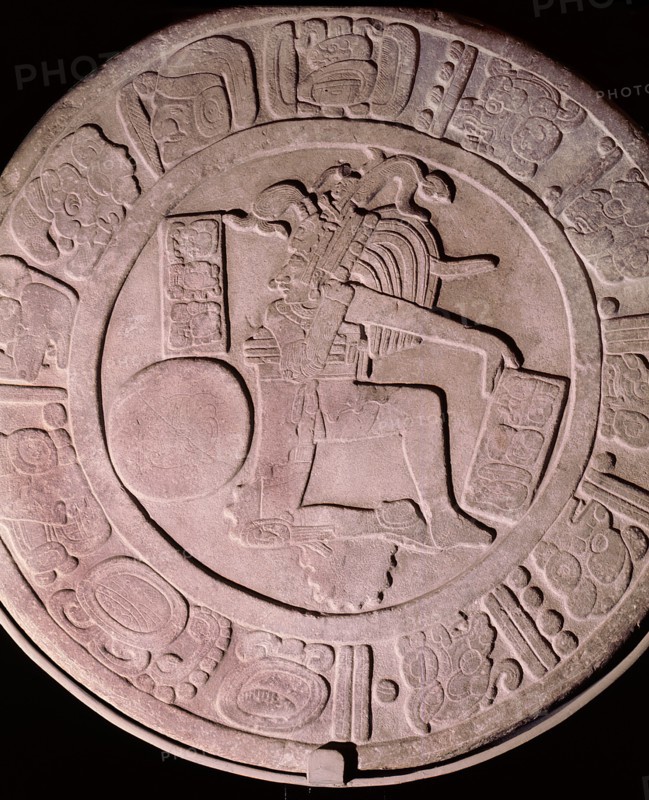 Disc with relief design representing a ball player