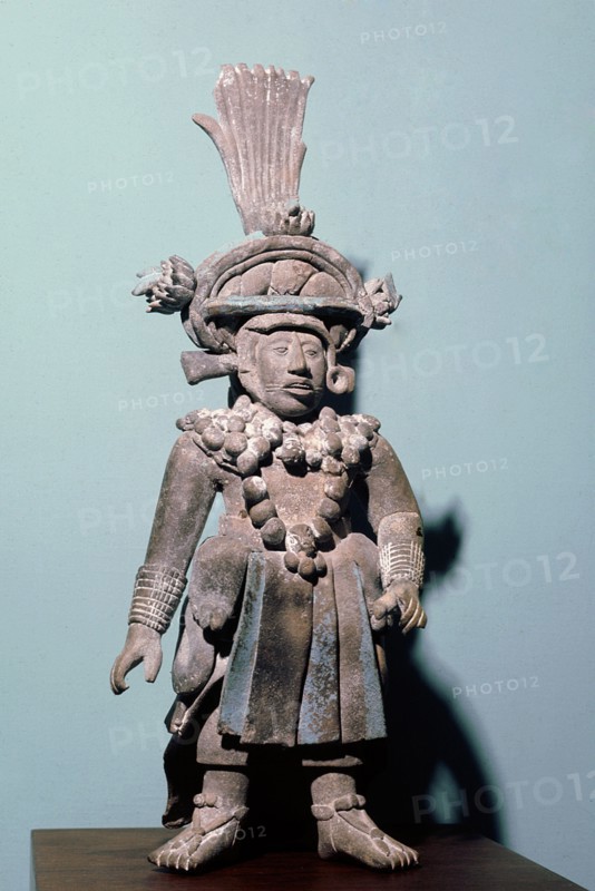 Figure of an important person in full regalia