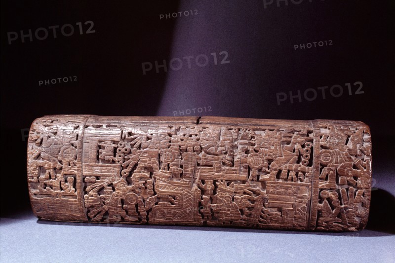 Intricately carved teponaztli or two toned drum