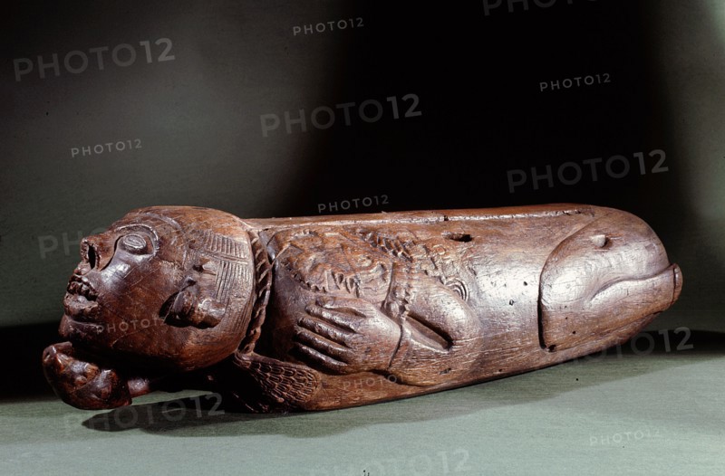 Teponaztli   two toned drum   in the form of a bound captive, probably a sacrificial victim
