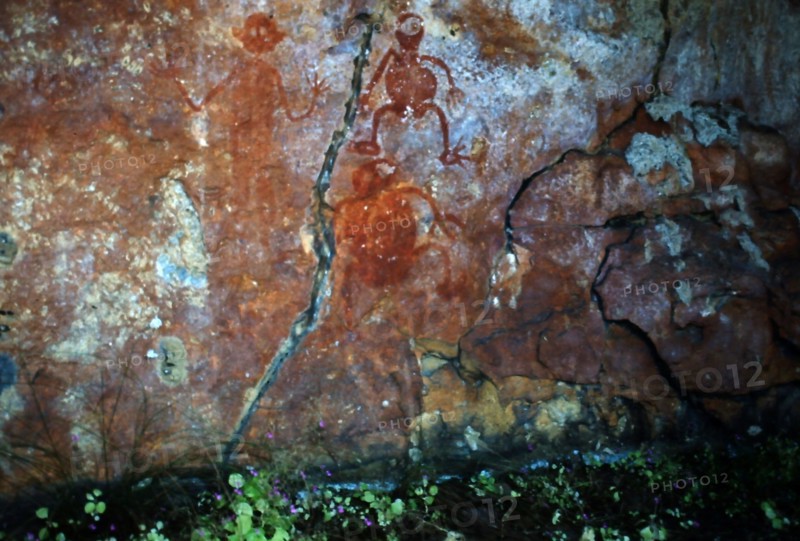 Aboriginal rock painting of a group impish like figures