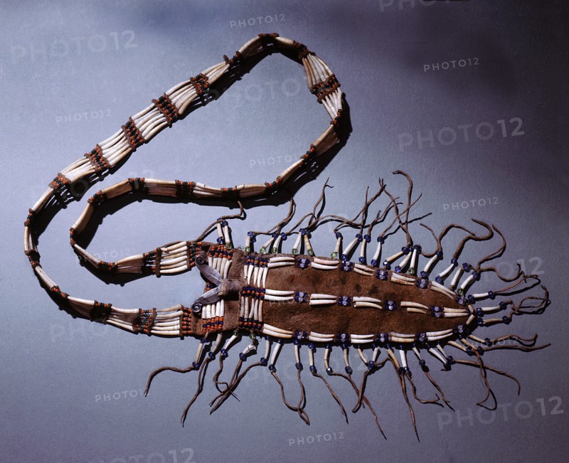 Cedar bark pouch decorated with glass beads obtained from Russian traders and dentolis shell from trade with the Northwest Coast