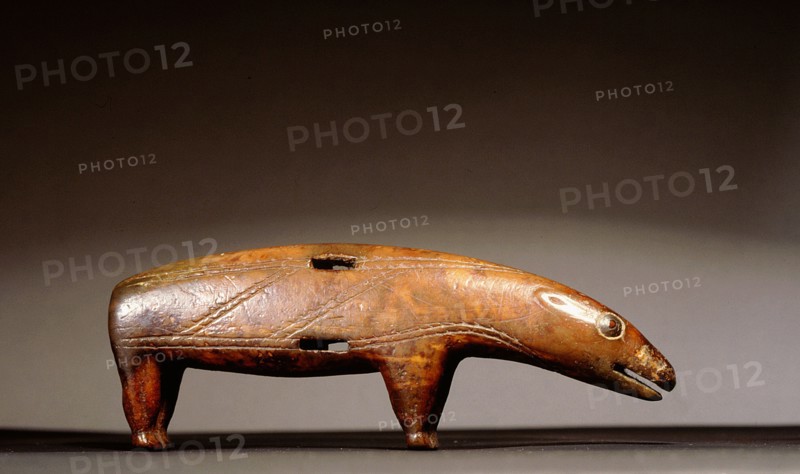 An ivory carving of a polar bear, probably a knife handle