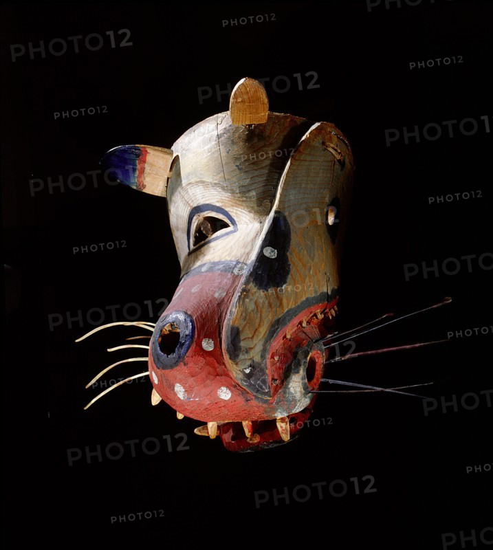Polychrome mask in the form of a stylized representation of an animal head