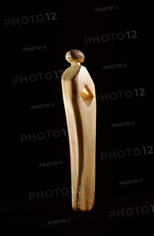 Ivory arrow shaft straightener with human head finial