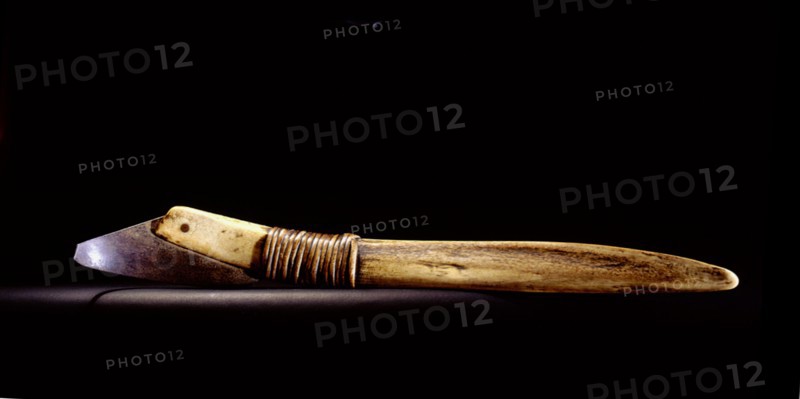 Side bladed knife