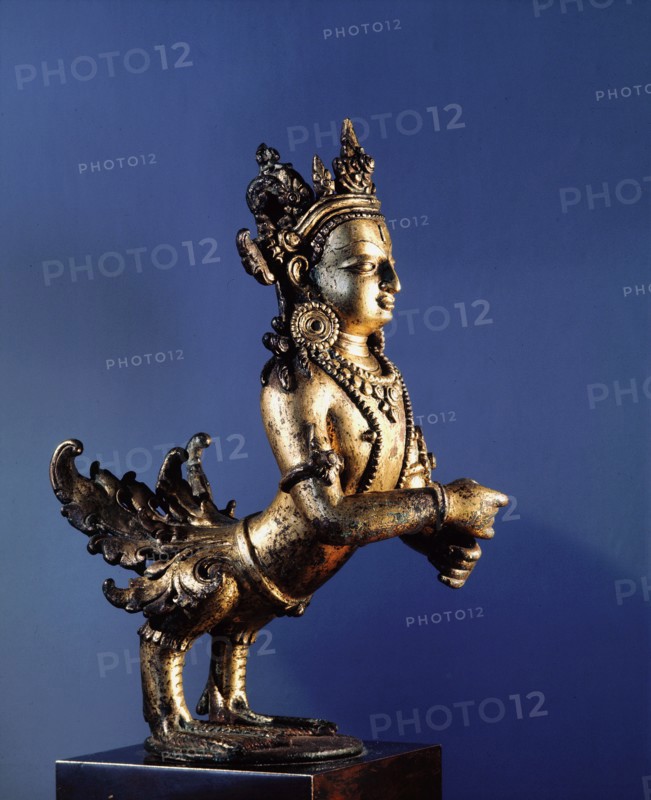Statue of a Kinnara a mythical being with lower body in the form of a bird and human upper body
