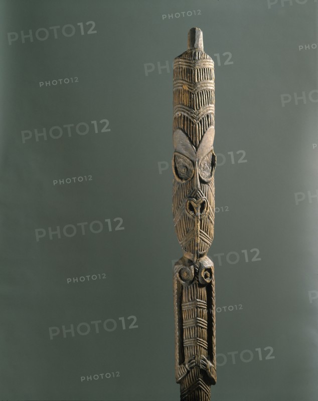 A Maori figure from the ridgepole of a meeting house or storehouse