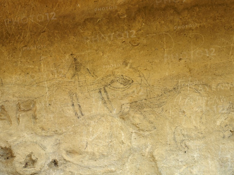 A Maori rock drawing of a man on horseback