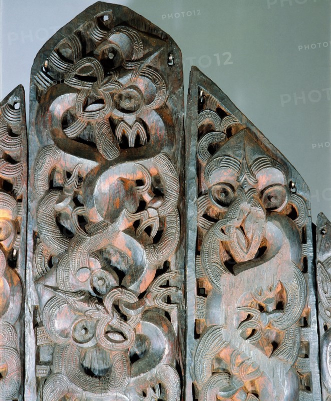 Five carved wooden end panels from a storehouse