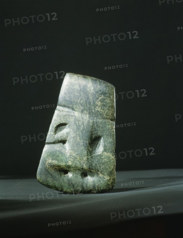 The blade of an adze partly converted into a heitiki during the early 19th Century