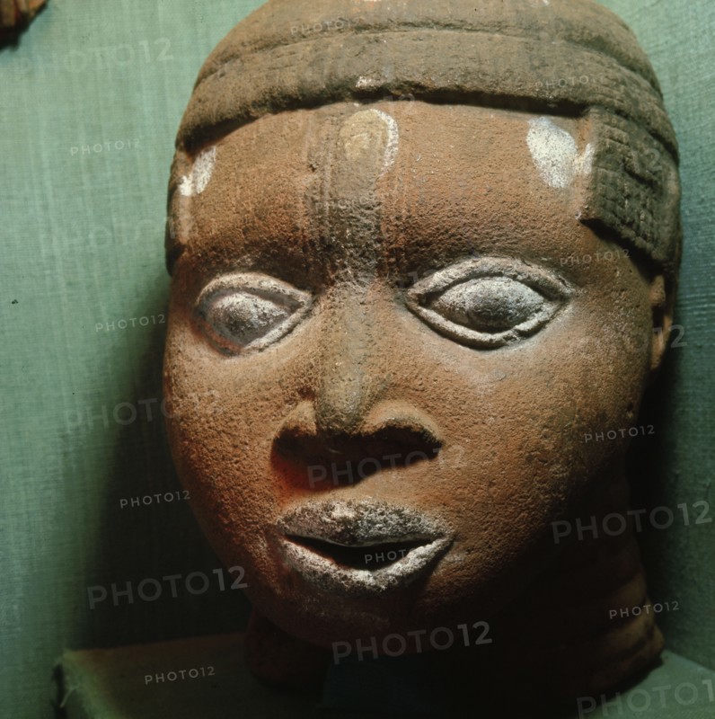 A terracotta head from the ancestral shrine of a leading member of the brass casting guild