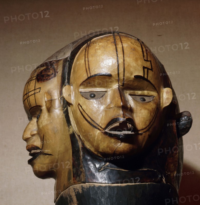 A janiform mask used in the Ekpo (ancestor spirit) secret society which formerly exercised governmental functions among the Ekoi