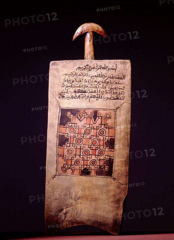 A wooden board from Hausa land with a sacred Arabic text from the Koran