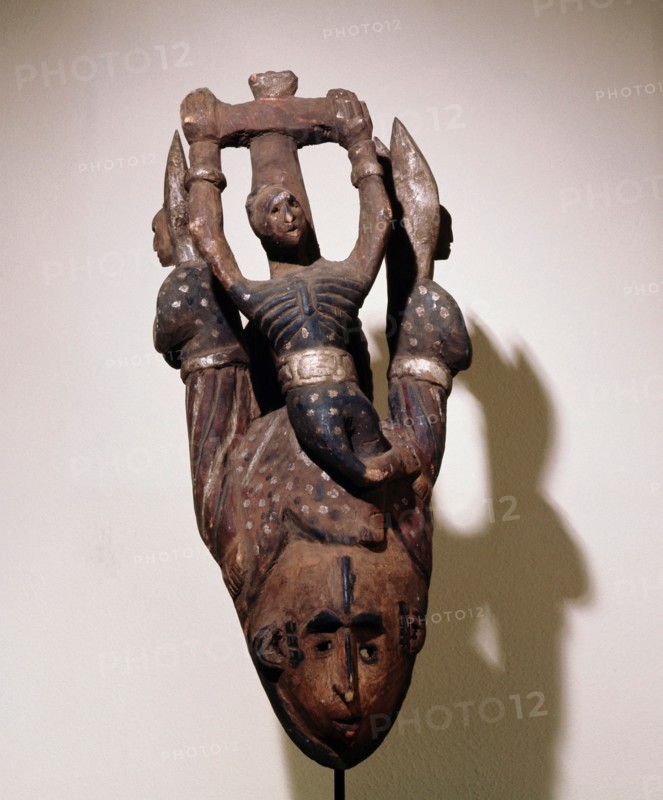 An Igbo mask of the white faced type that usually represent a beautiful girl
