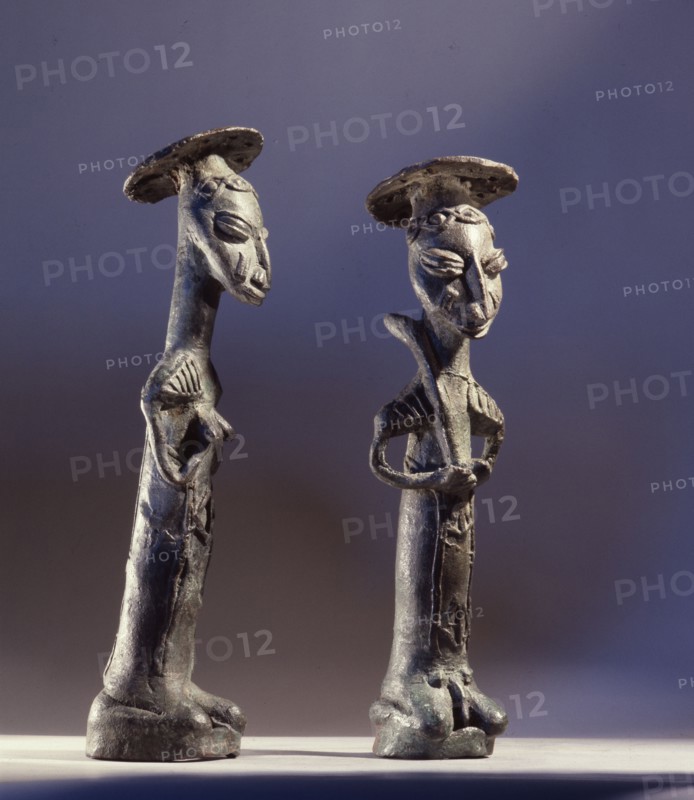 Bronze male and female figures representing the owners of the land