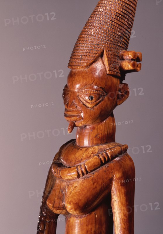 An ivory figure of a standing female which was probably a shrine figure