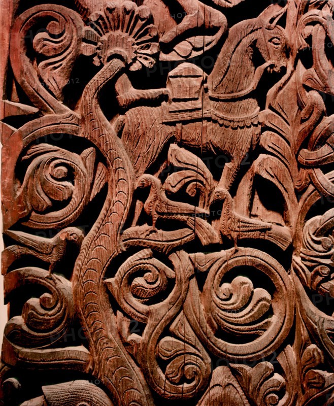 Detail of a carving from a stave church portal illustrating the story of Sigurd