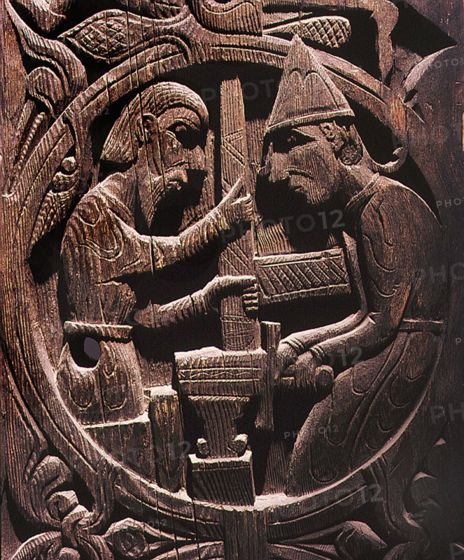 Stave church carving with a scene from the story of Sigurd