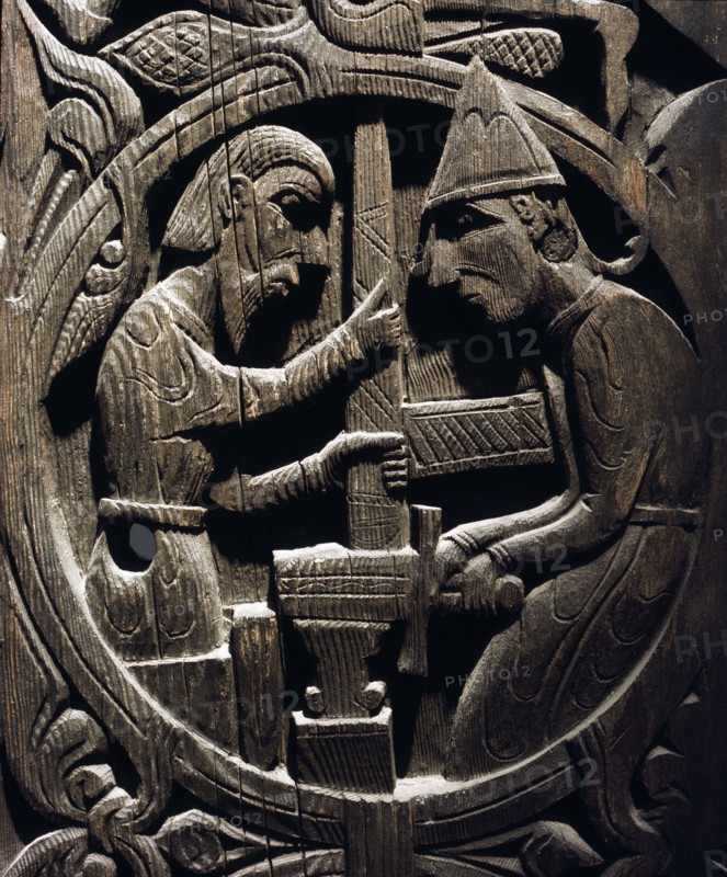 Stave church carving with a scene from the story of Sigurd