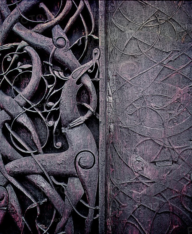Detail of the carving on the side of the stave church at Urnes