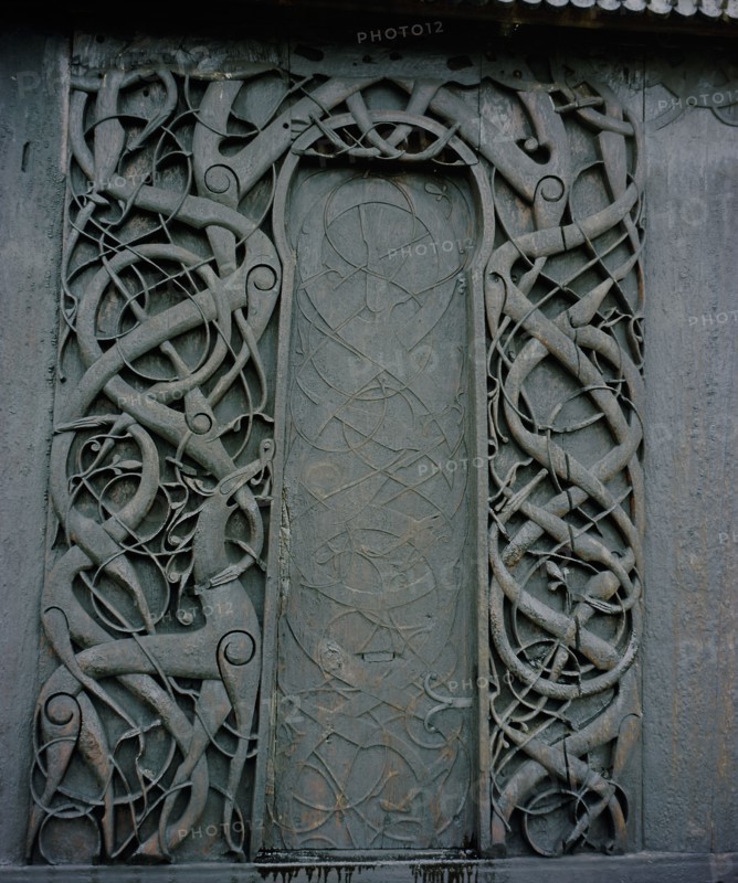 Carving on the side of the stave church at Urnes