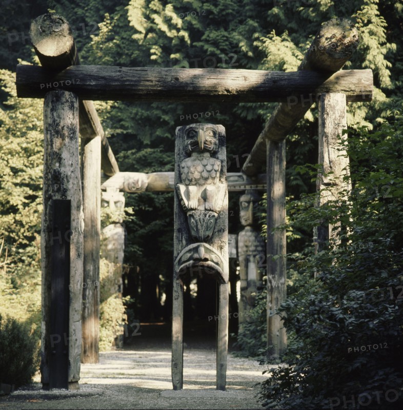 House posts carved with totemic animals