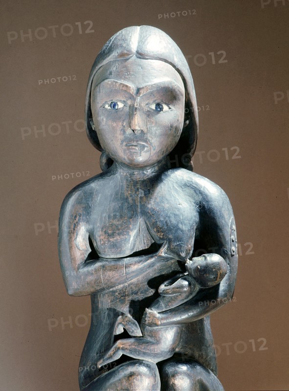 Mother breast feeding her child (detail)