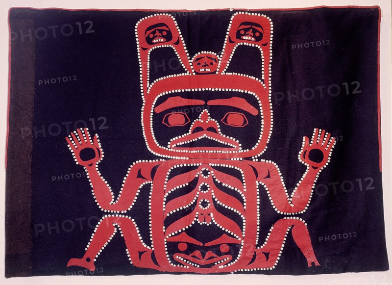 Worn as a ceremonial cloak, the button blanket was in general use after trade blankets became available