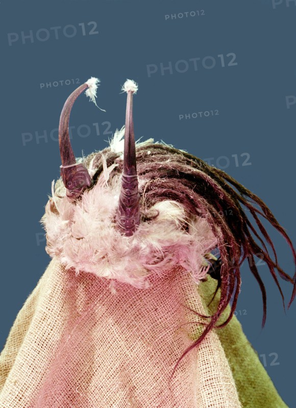 Shamans headdress (known as shamans hair) made of birds skin, human hair and goats horns with carved design