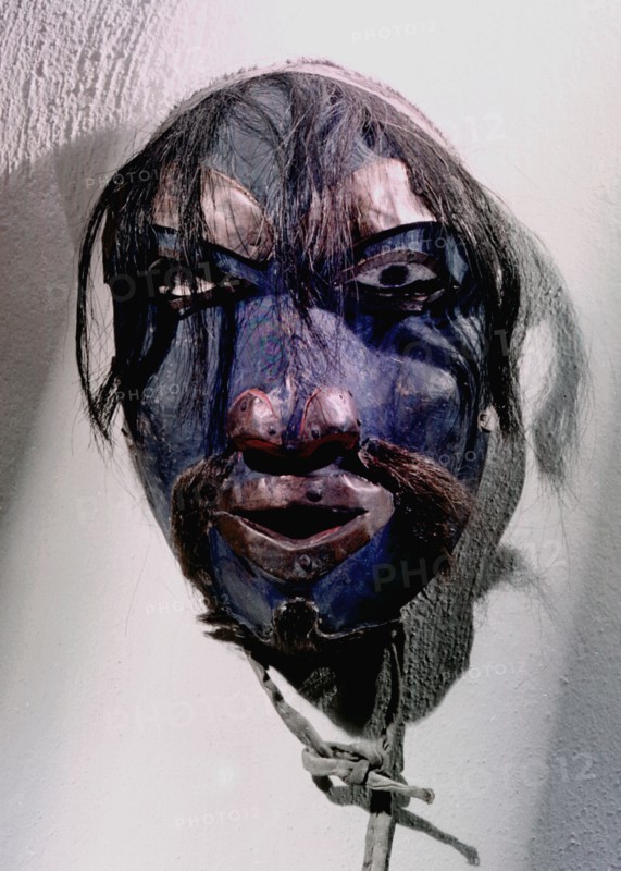 Shamans mask in the form of a human face
