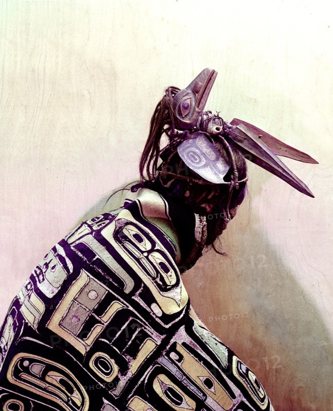 Model of a dancer dressed in cloak and ceremonial headdress