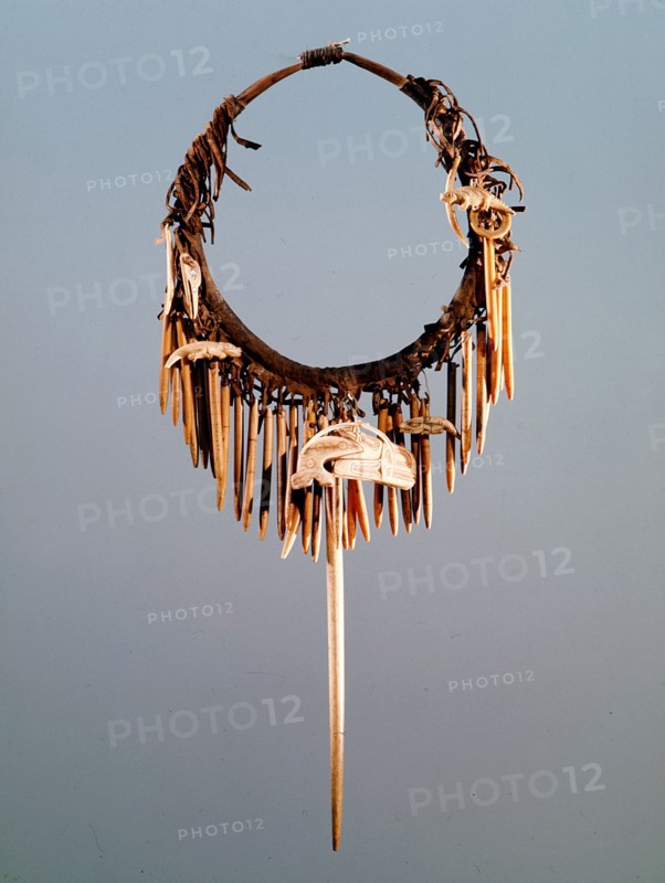Part of a Haida shamans gear included a neckring from which various bone charms were suspended