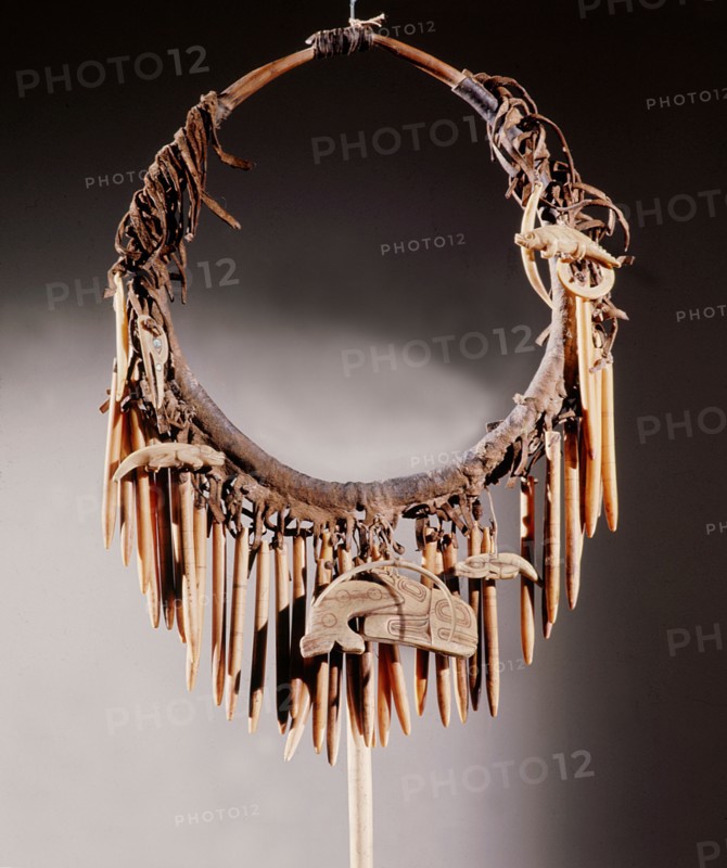 Part of a Haida shamans gear included a neckring from which various bone charms were suspended