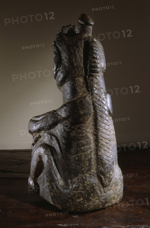 Stone human figure bowl, thought to have been used by Salish shamans in purification rites as part of ceremonies marking the onset of female puberty