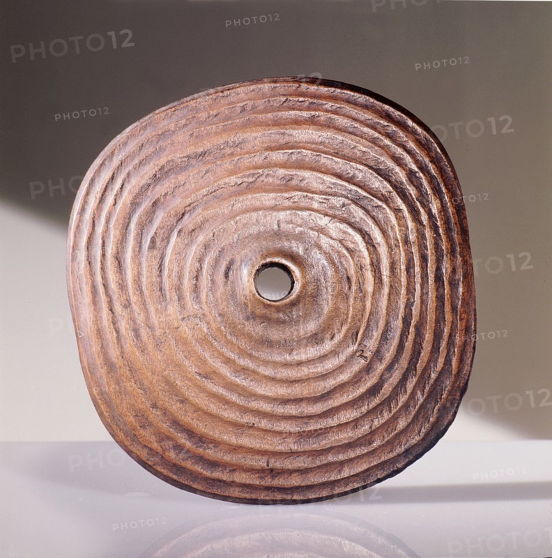 Spindle whorl, used by the Coast Salish during spinning to prevent the wool slipping from the spindle