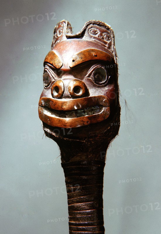 The carved handles of a fighting knife