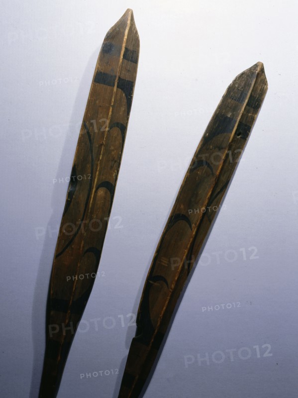 Single bladed paddles used to propel kayaks
