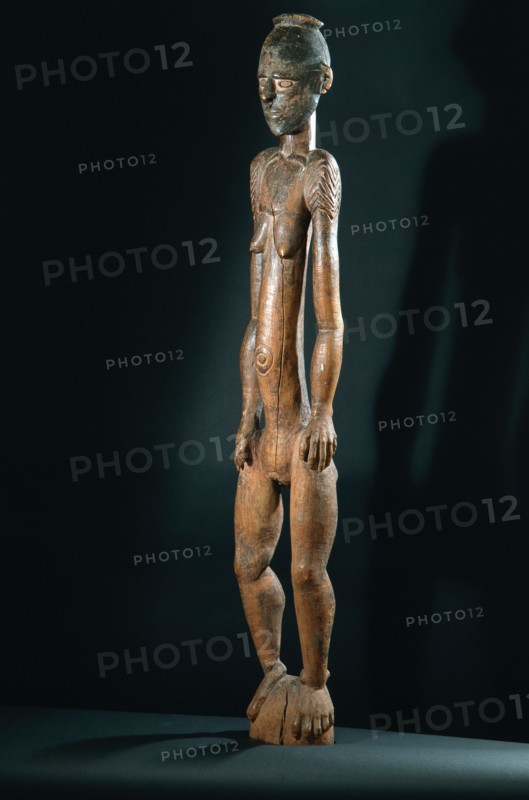 Carved female figure from the middle Sepik area, probably a depiction of a female clan ancestress from a mens meeting house