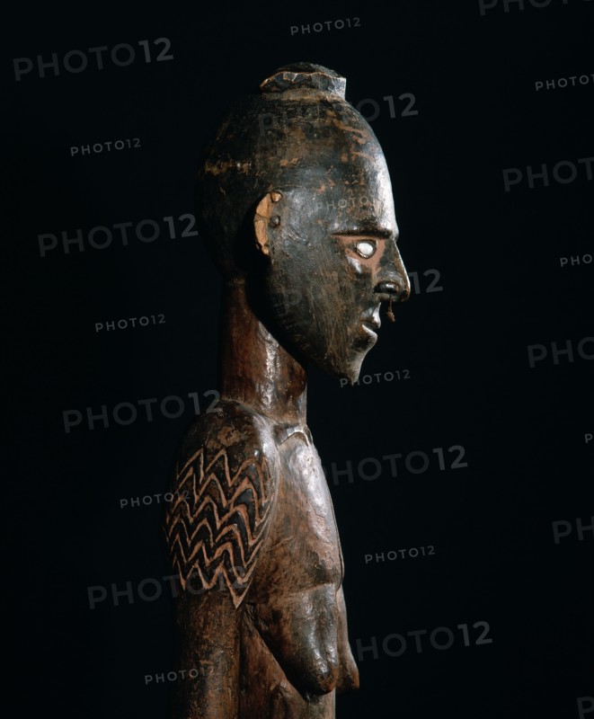 Carved female figure from the middle Sepik area, probably a depiction of a female clan ancestress from a mens meeting house