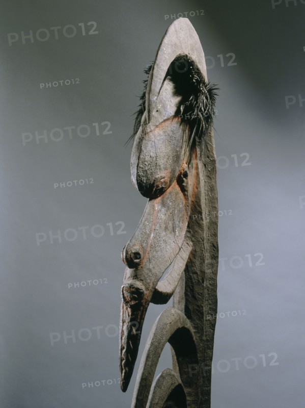 Stylised figure of spirit, known as Yipwon, that assists men with hunting and head hunting, kept in the mens house and hidden from women and uninitiated