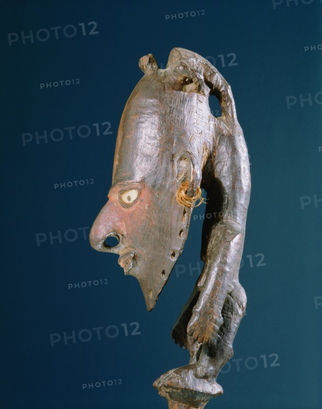 Figural stopper from a flute