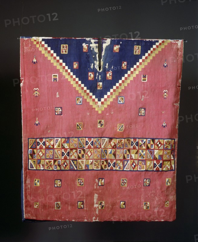 This multi coloured poncho is typical of Inca design with interlocking geometric patterns