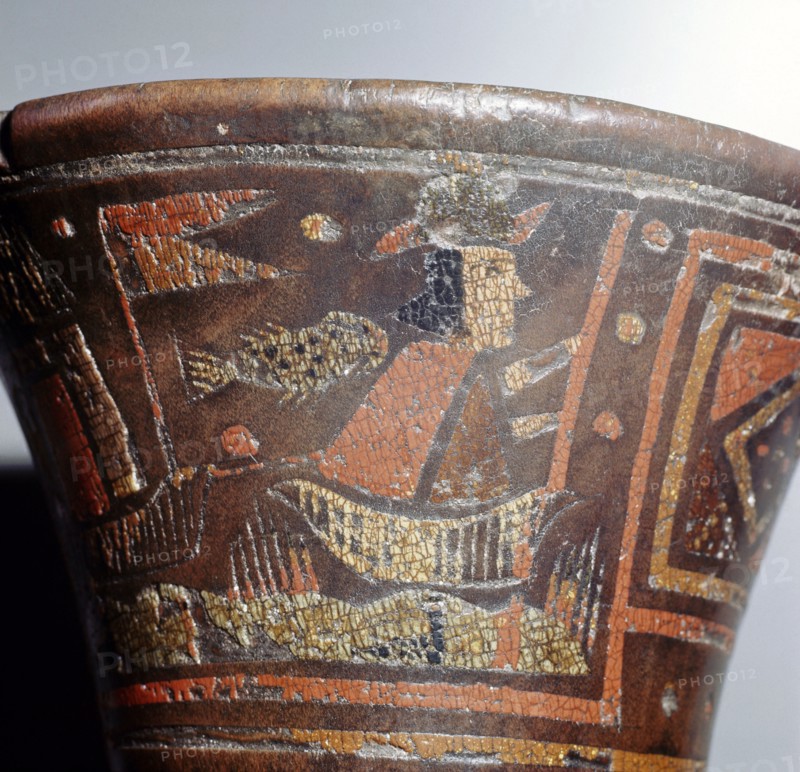 Detail of the upper register decoration on a ritual drinking vessel known as a kero, and which is designed in the hybrid Inca Spanish style