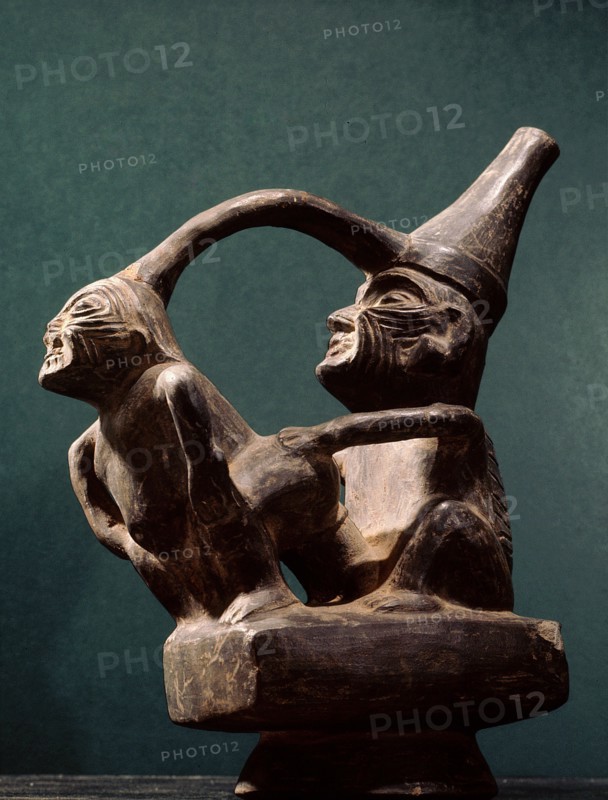 Stirrup spouted vessel depicting  copulating couple