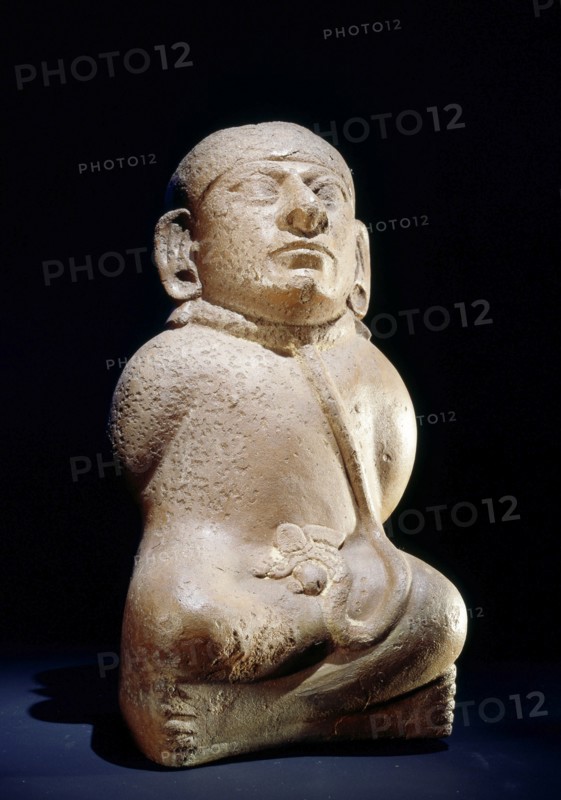 Mochica vessel in the form of a seated prisoner with his hands bound behind his back